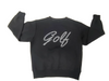 A black sweatshirt with the word 'Golf' written across the front in a white, pearl-like embellishment. Luxury Design with tee holder on the sleeve. Best Seller