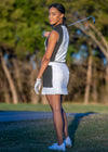 Luxury Black & White Active Skirt for women, designed with flattering fit, performance fabric, and built-in shortie with phone pocket, perfect for golf, tennis, pickleball, or everyday wear.
Women’s Black & White Mock Neck Active Polo — luxury golf, tennis, and pickleball polo with chic color-blocking, modern mock collar, breathable four-way stretch fabric, and back zipper detail.