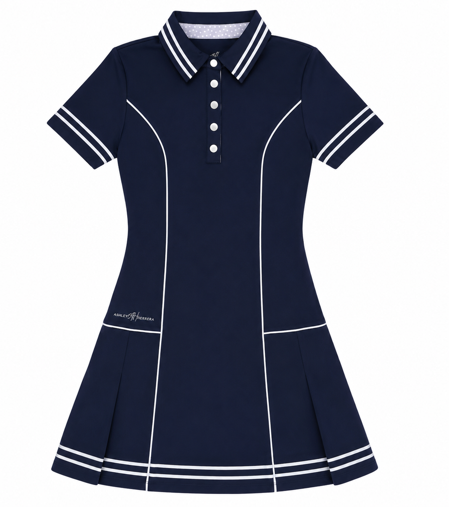 A navy blue short-sleeve polo dress with white contrast piping, a white button placket, and a white patterned inner collar. Luxury Tennis, Golf, Pickleball