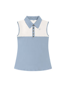  Vanessa Polo in Cloud Blue — women’s luxury sleeveless golf and tennis polo with silver button detailing, contrast inner collar fabric, and breathable vented back for all-day comfort.