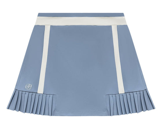 Vanessa Skort in Cloud Blue — women’s luxury golf and activewear skort featuring elegant piping, micro pleats, and functional details like a 3-tee holder and back pockets.