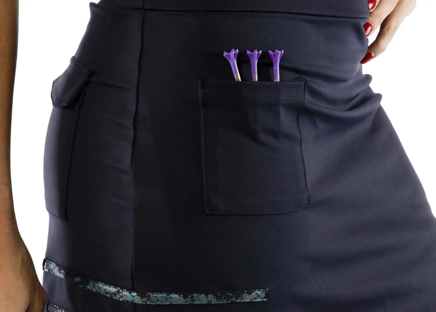 Light Blue Snake detailed Skort — luxury golf, tennis, and pickleball skort with metallic snake-print accents, elastic drawstring waist, functional pockets, and performance fabric with four-way stretch, UV protection, and quick-dry.