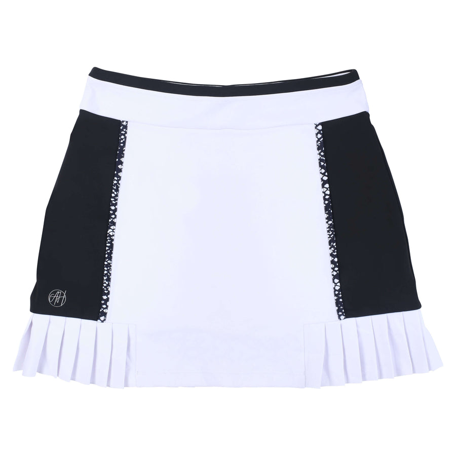 Women’s Black & White Active Skirt — luxury golf, tennis, and pickleball skirt with elegant pleats, color-block details, built-in shortie with phone pocket, four-way stretch, quick-dry, and UV protection.